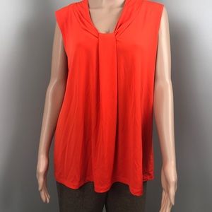 Ladies sleeveless blouse 
By: Dana Buchanan
Xl